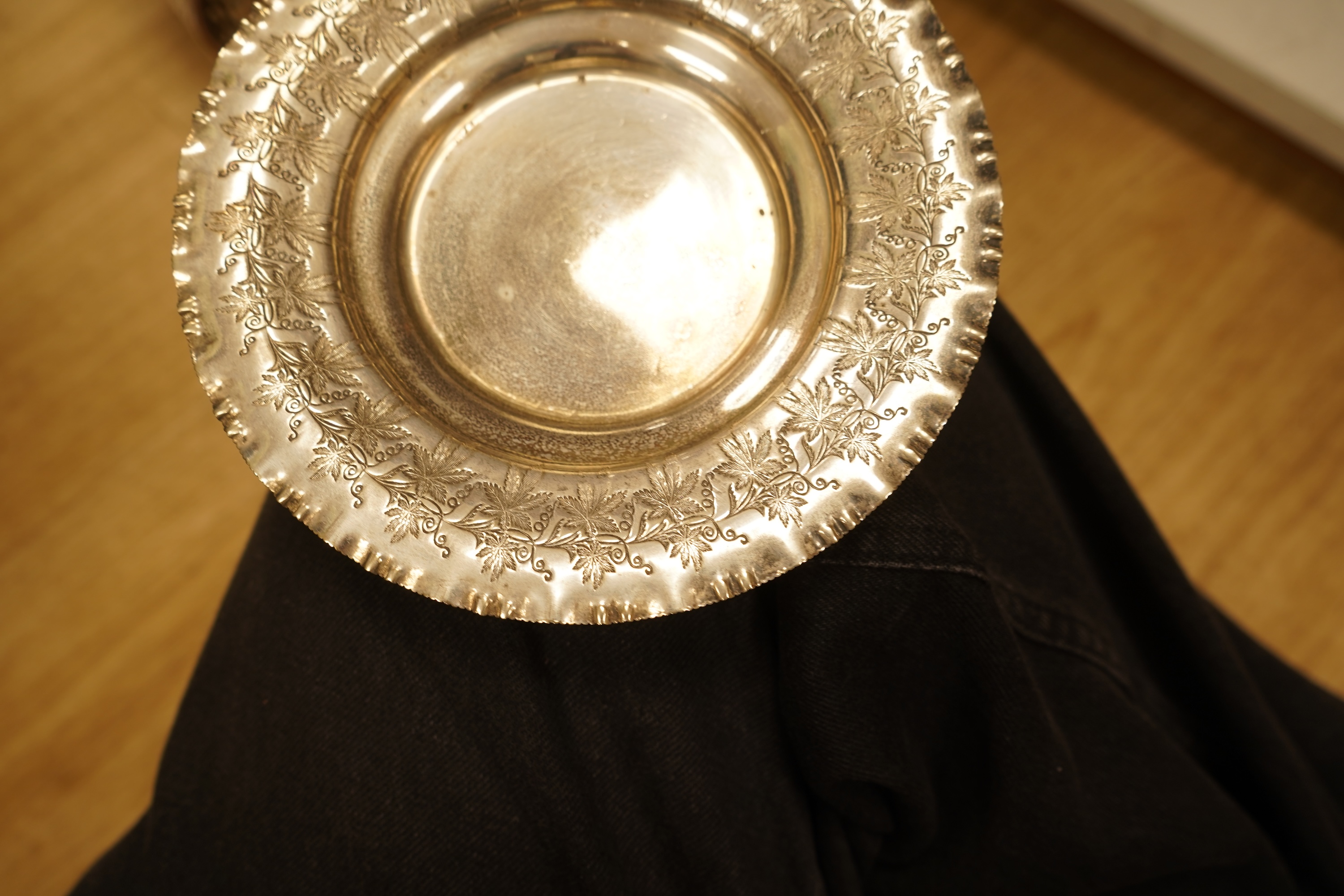 A quantity of assorted plated wares including a pair of 19th century wine coasters, antimony box, toast rack and flatware.